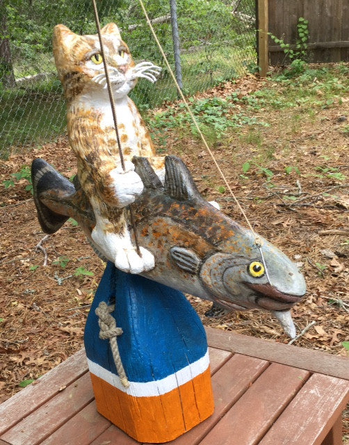 Tabby Cat on Atlantic Cod sculpture
